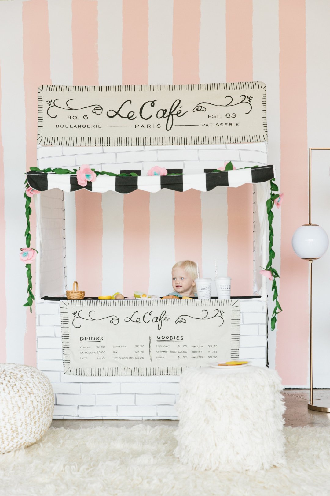 Shop Snack Shack Playhouse, Felt Flower Garland, Cosmos Floor Lamp, Knit Gold Pouf, White Shag Pouf, 8x10' White Flokati Rug and more