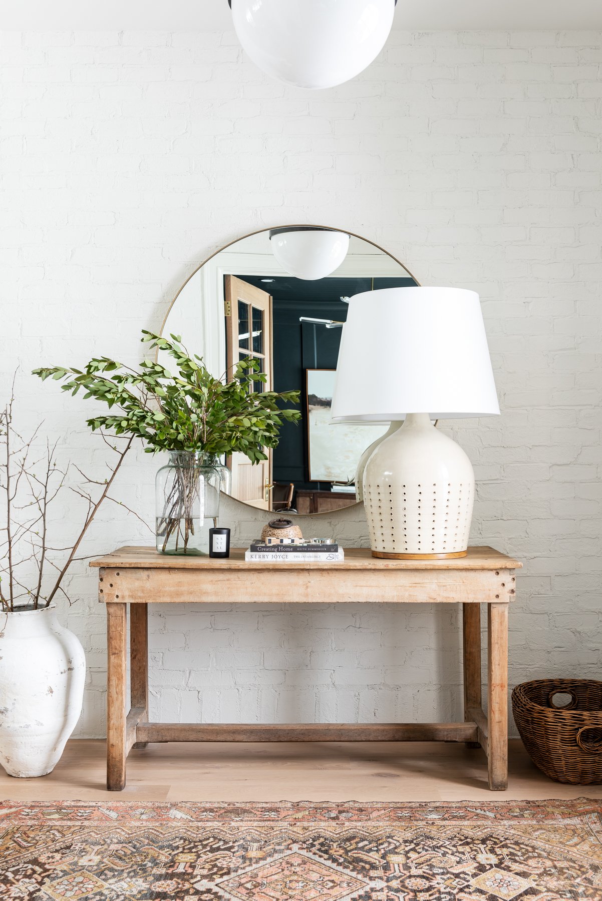 Curated image with Solange Mirror, Modern Schoolhouse Lantern, Rice Wine Jar, Santal Noir Candle,...