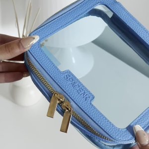 &rsquo;s mediaimport video of Space NK Peach Lip Holder Charm,Space NK Medium Travel Bag Poolside Blue