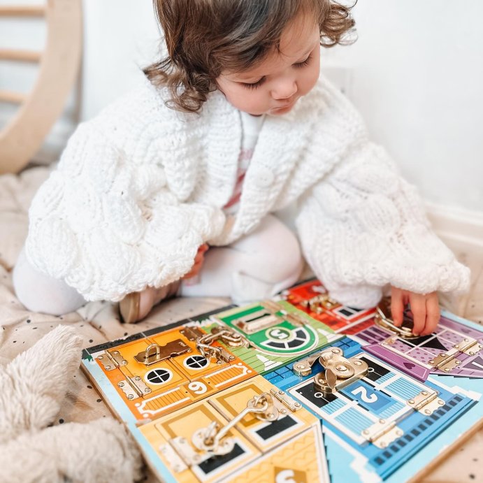 user image by @mamandmayhem, Melissa &#38; Doug Latches Wooden Activity Board