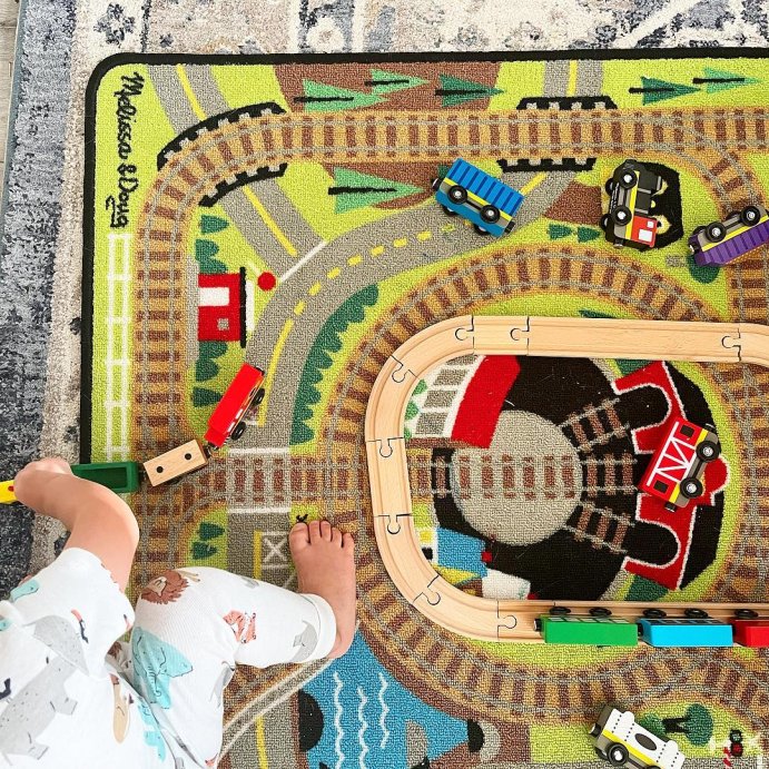 user image by @adventuresinplay, Melissa &#38; Doug Round the Rails Train Rug With 3 Linking Wooden Train Cars  (39 x 36 inches)