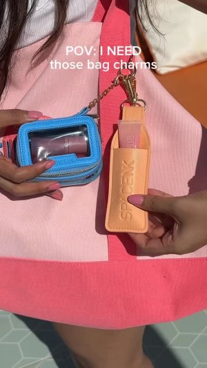 @spacenk&rsquo;s instagram video of Space NK Micro Travel Bag Charm Poolside Blue,Space NK Peach Lip Holder Charm