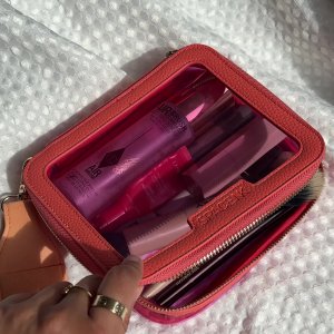 &rsquo;s mediaimport video of Space NK Medium Travel Bag Sunset Peach,Space NK Peach Lip Holder Charm
