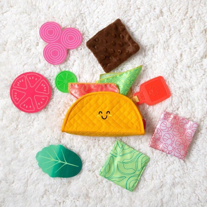 user image by @kidscornerkzn, Melissa &#38; Doug Multi-Sensory Soft Taco Fill &#38; Spill Infant Toy