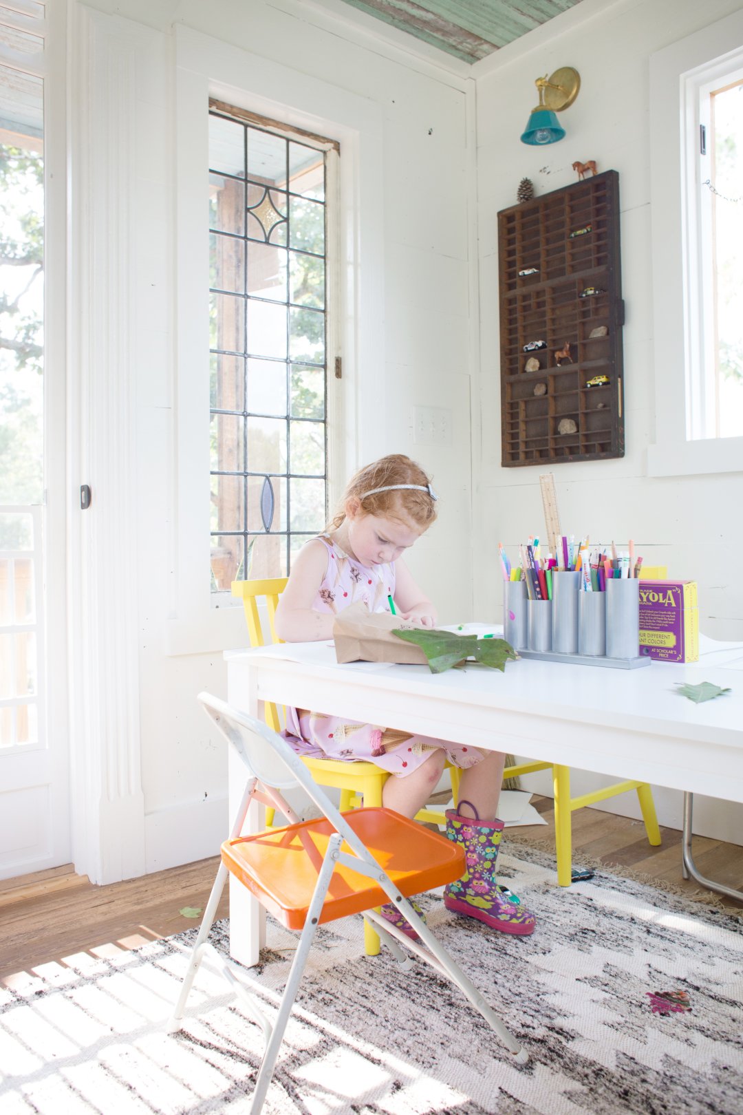Shop How to Decorate a Treehouse for Kids, Silver Metal Storage Caddy, Shore Yellow Kids Chair, Large White Adjustable Kids Table w/ 23" Legs, Fringe 8 x 10' Rug and more