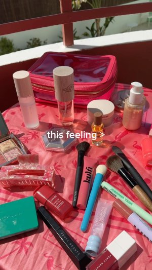 @spacenk&rsquo;s instagram video of Space NK Large Travel Bag Flamingo Pink,Kulfi Lip Snack Glossing Lip Balm,Westman Atelier Sun Tone Bronzing Cr&egrave;me,Space NK Pink Claw Clip,KOSAS Lip Pulse Glassy Lip Plumper,Rare Beauty Always An Optimist Pore Diffusing Primer,Sol de Janeiro Cheeky Biqu&iacute;ni Perfume Mist,Fenty Beauty Hella Thicc Volumizing Mascara,LANEIGE JuicePop Box Lip Tint,Fenty Beauty Diamond Bomb All-Over Diamond Veil