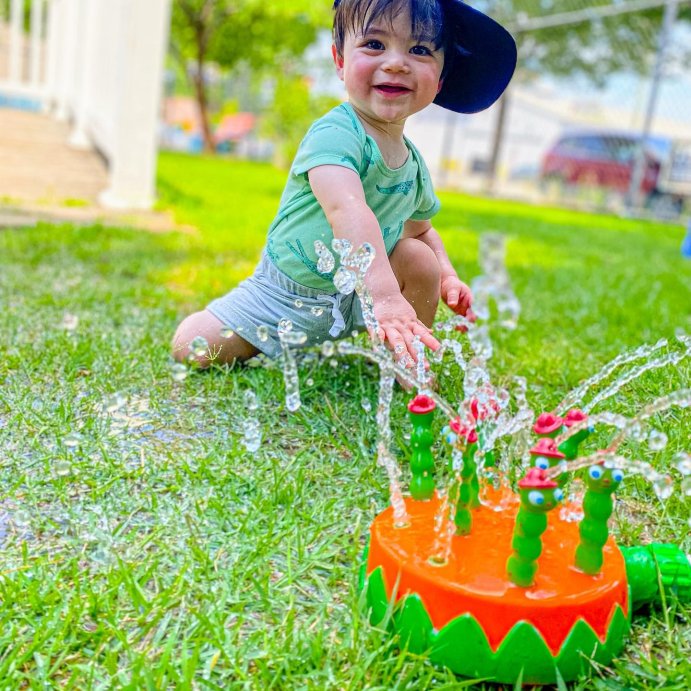user image by @doublethedadjokes, Melissa &#38; Doug Sunny Patch Splash Patrol Outdoor Sprinkler Toy with Hose Attachment