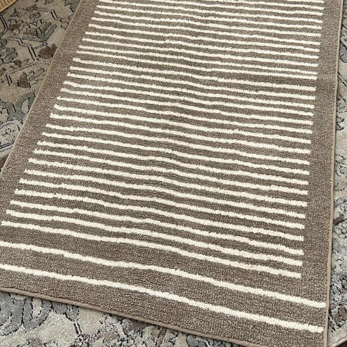 user image by @havenkai_home, 2'6"x4' Washable Knitted Stripe Accent Rug - Threshold™
