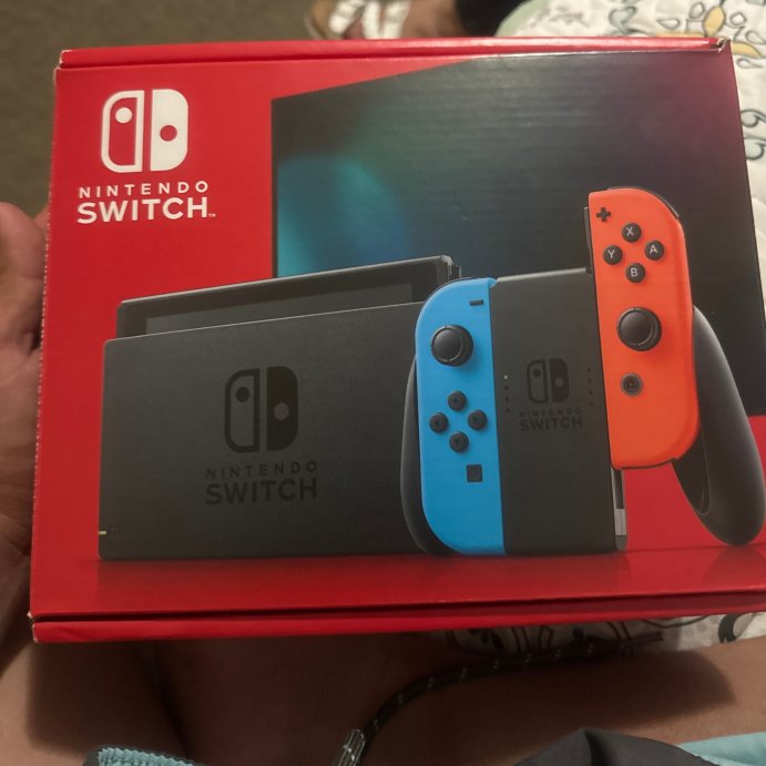 user image by Miguel Fernandez, Nintendo Switch with Neon Blue and Neon Red Joy-Con