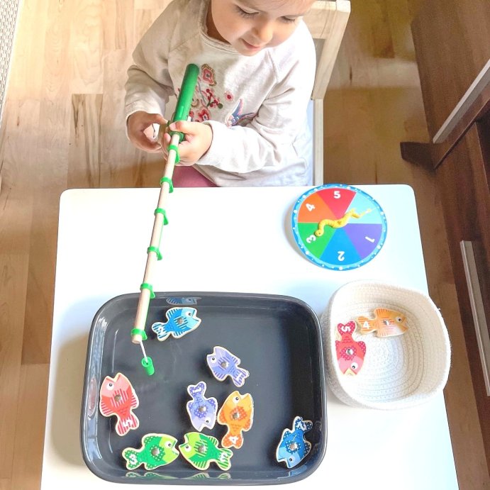 user image by @melissaanddougtoys, Melissa &#38; Doug Catch &#38; Count Wooden Fishing Game with 2 Magnetic Rods