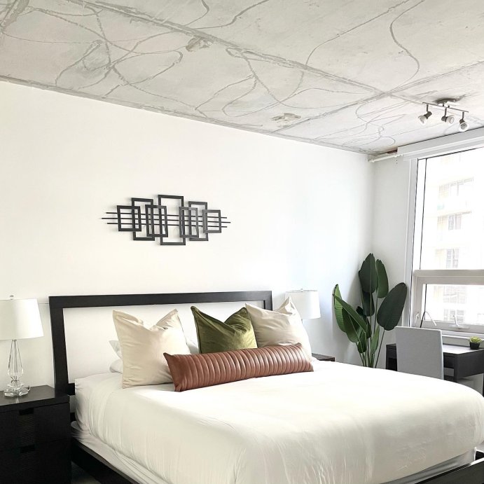 user image by @miamicitycondo, Lumbar Faux Leather Channel Stitch Decorative Throw Pillow - Threshold™