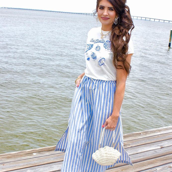user image by @heatherlaurenjohnson, Straw Clamshell Clutch Handbag - A New Day&#8482; Light Beige