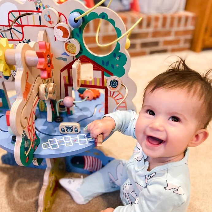 user image by @thismessymamahood, Manhattan Toy Playground Adventure Wooden Toddler Activity Center with Gliders, Abacus Track, Spinners, Spring Toys and Bead Runs