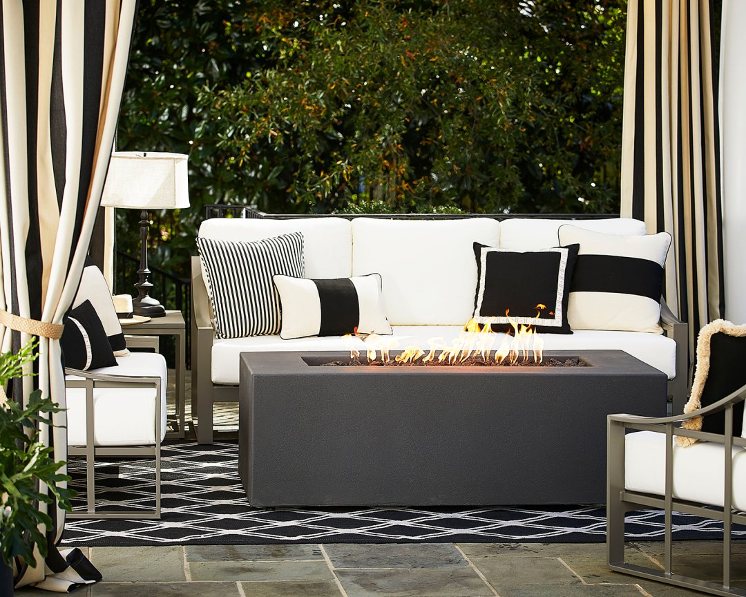 Shop Estes Rectangular Fire Table, Tricia Trellis Indoor/Outdoor Rug, Dani Outdoor Table Lamp, Color Block Indoor/Outdoor Pillow, Applique Trim Sunbrella Outdoor Pillow, Ballard Indoor/Outdoor Drapery Panel with Weighted Corners and more
