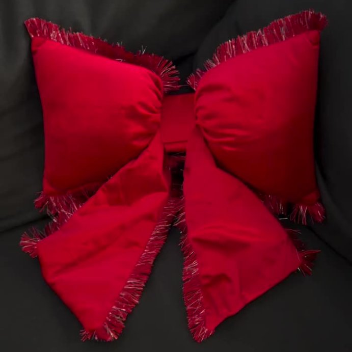 user image by @_angie.89, 20" Christmas Bow Shaped Pillow - Wondershop™