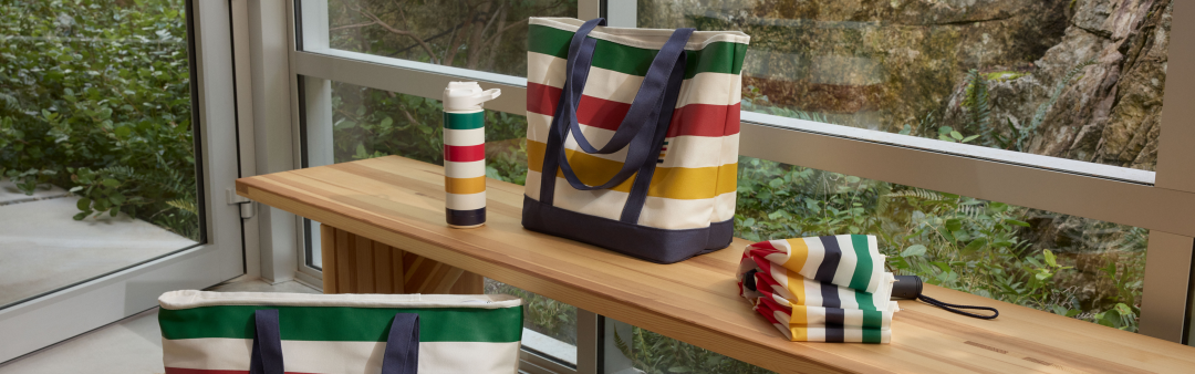 Shop Hudson's Bay Stripes Signature Water Bottle, White, 26-Oz, Hudson's Bay Stripes Insulated Canvas Cooler Bag, Navy, Hudson's Bay Stripes Signature Canvas Tote Bag, Navy, 7.5-in, Hudson's Bay Stripes Umbrella, Multi-Coloured, 38-in and more