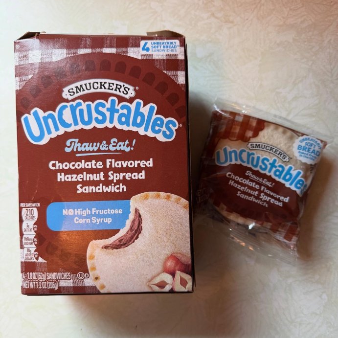 user image by @honestsubscriptionbox, Smucker's Uncrustables Frozen Chocolate Flavored Hazelnut Spread Sandwich