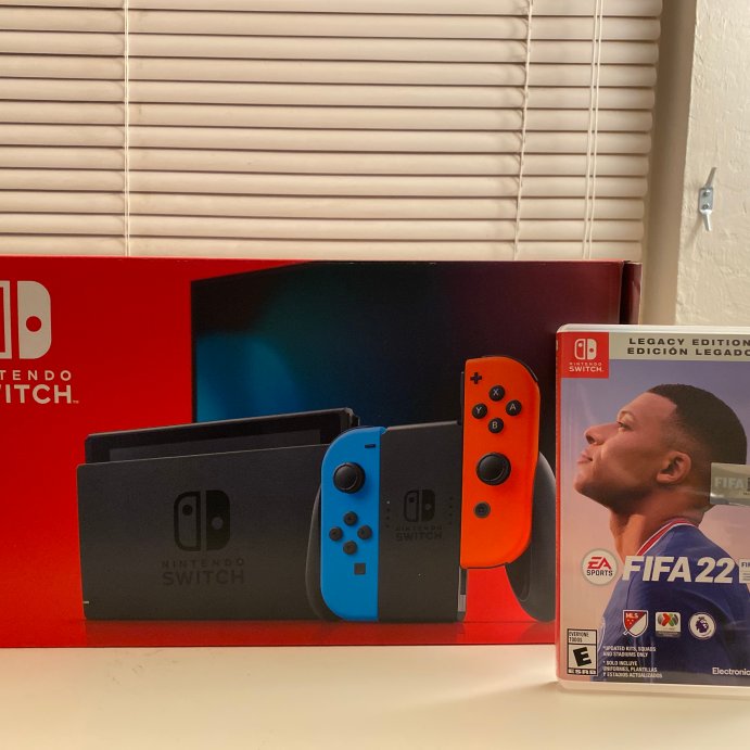 user image by Armando Covarrubias, Nintendo Switch with Neon Blue and Neon Red Joy-Con