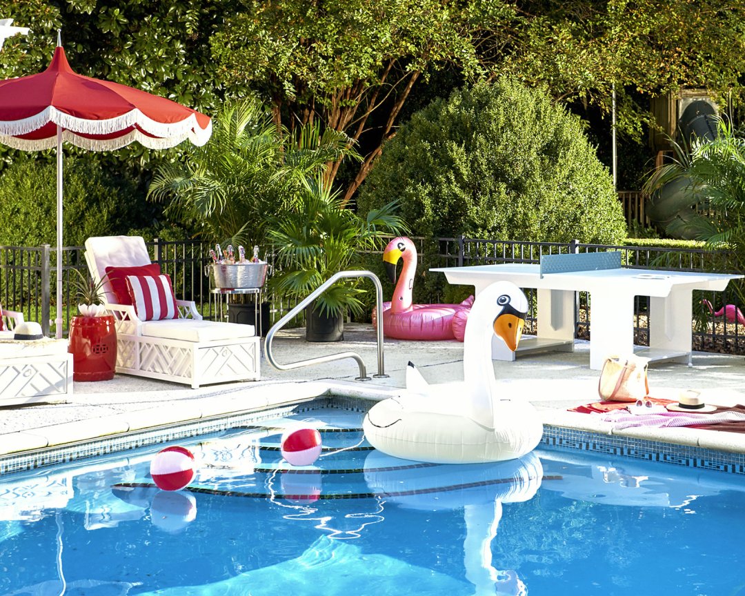 Shop Pacific Pagoda 8.5 ft Umbrella with Fringe Edge, Del Ray Outdoor Ping Pong Table, Miles Redd Bermuda Chaise with Cushions - Ballard Designs, Avalon Double Walled Beverage Tub with Stand & Tray - Ballard Designs and more