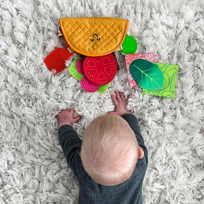 user image by @hayley_emma_x, Melissa &#38; Doug Multi-Sensory Soft Taco Fill &#38; Spill Infant Toy