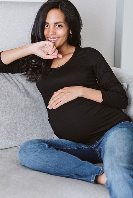 Shop Isabella Oliver The Maternity Scoop Top with LENZING™ ECOVERO™-Caviar Black, Isabella Oliver Over the bump Organic Maternity Boyfriend Jean-Washed Indigo and more