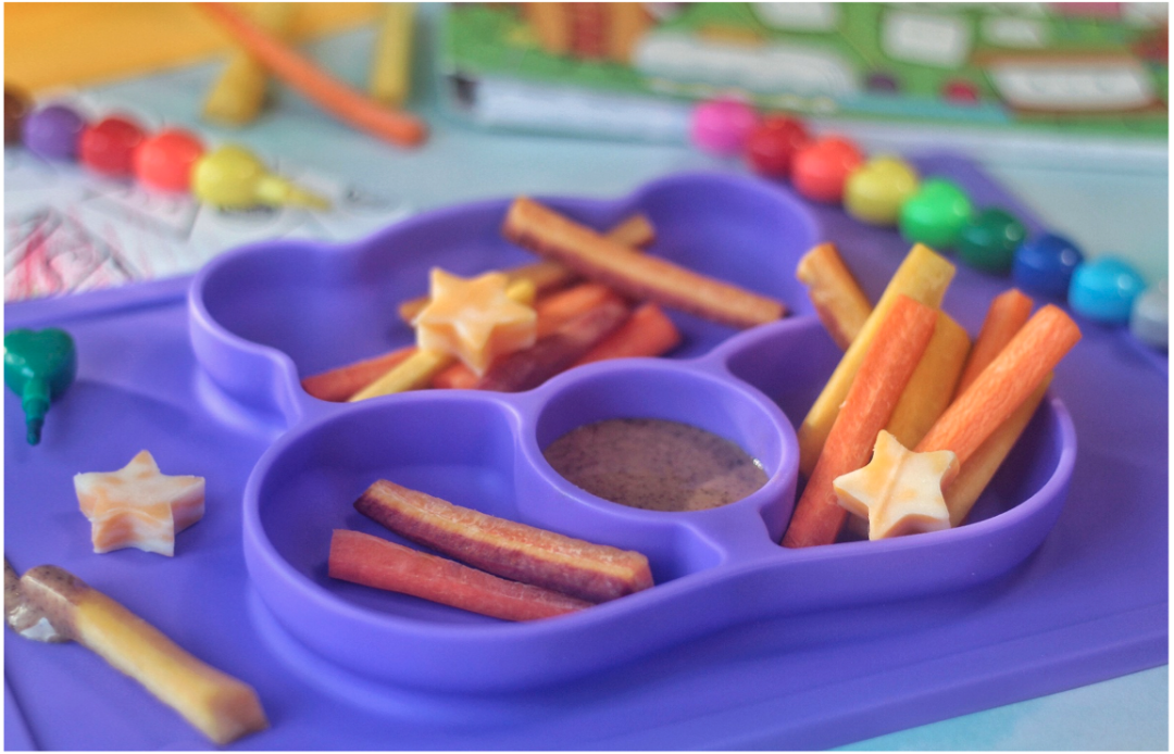 Shop Care Bear Purple Happy Mat by ezpz - Land Of Nod Plates & Utensils - Kids & Baby Furniture, Bedding and Toys and more