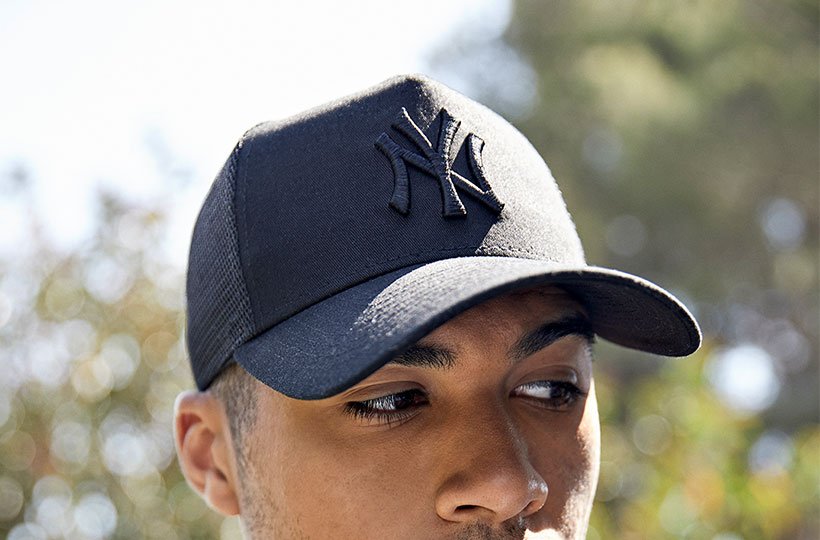 New era store cap on head