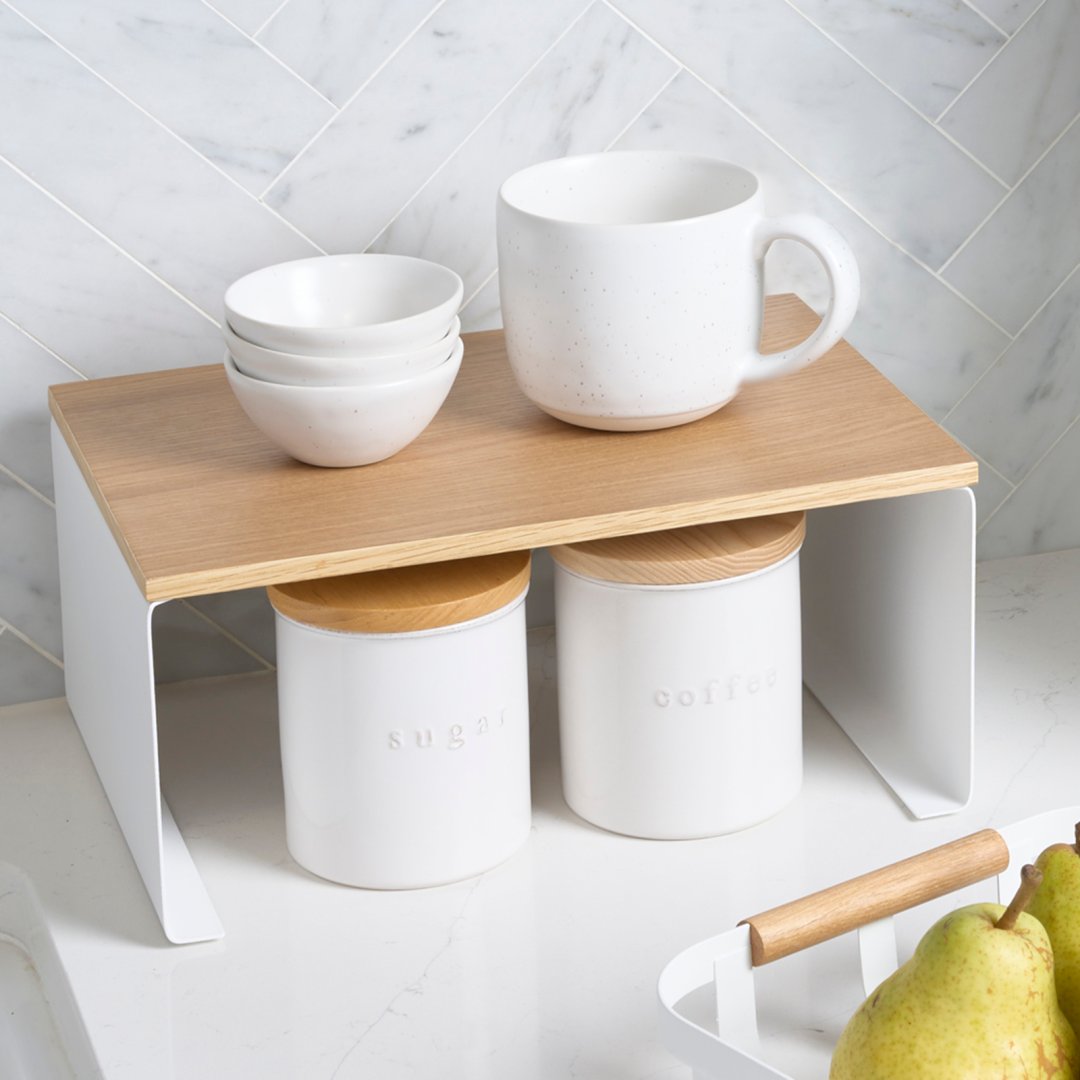 Ceramic Canisters by Yamazaki Home on a kitchen counter.