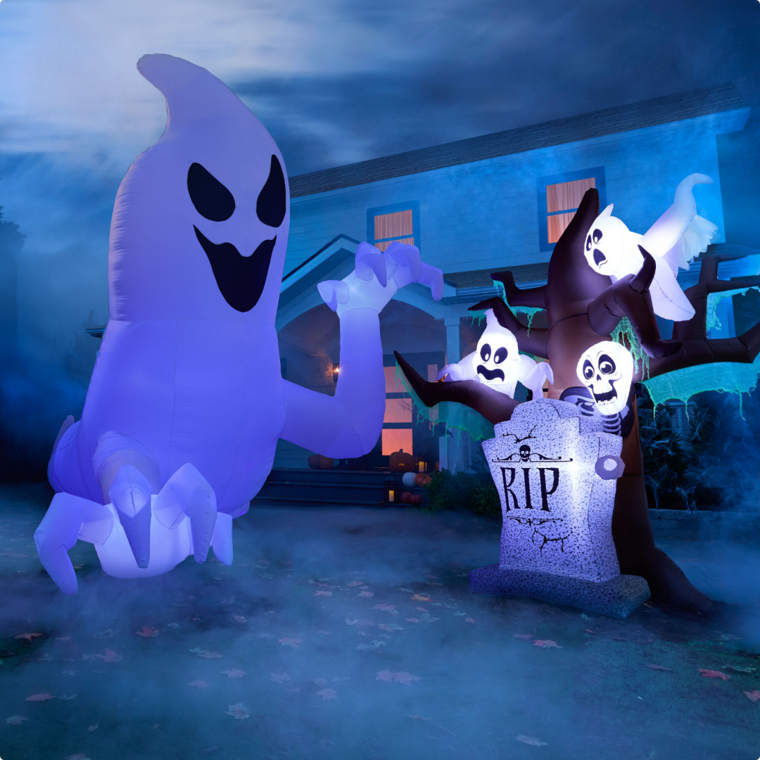Shop Gemmy Air Blown Ghost Ground Breaker Decoration, 14-ft, Gemmy Air Blown Haunted Tree with Tombstone Decoration and more