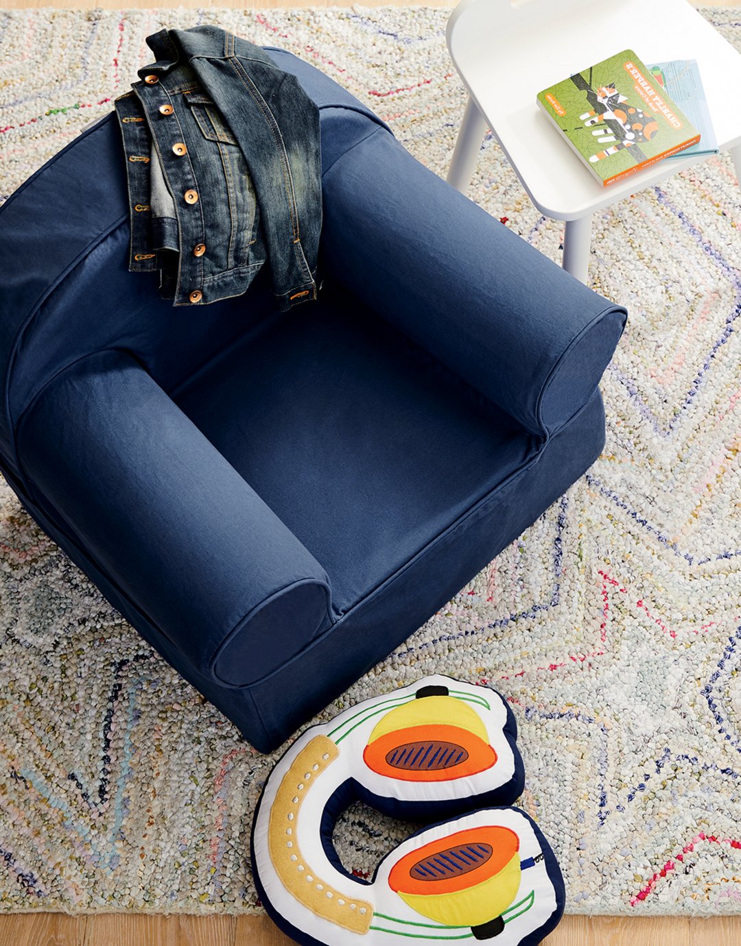 Shop Large Navy Nod Chair, Headphone Throw Pillow, 8 x 10' Seeing Stars Rug - Land Of Nod All Rugs - Kids & Baby Furniture, Bedding and Toys and more